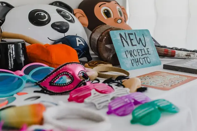 Summer Party Ideas in Cumbria That Aren't Just a BBQ 2 Photo booth props laid out at a summer party in Cumbria