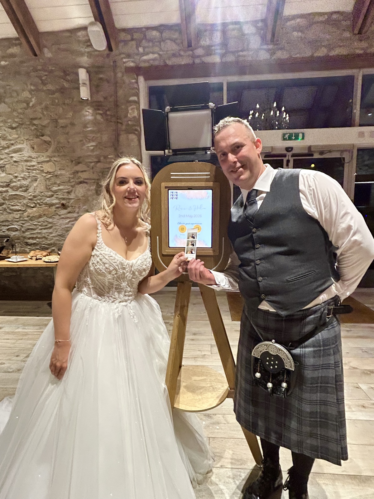 Vintage Photo Booth Cumbria 3 Bride and groom posing with the vintage selfie pod at a Cumbria wedding